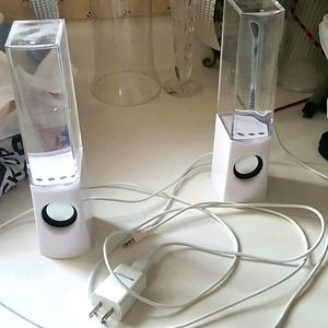 Speakers light different color